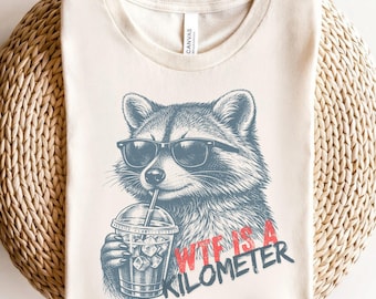 Raccoon Shirt WTF Is A Kilometer Funny T-Shirt, Raccoon American Meme Tee, Patriotic Raccoon Graphic T-Shirt, Women Funny Gift For Men