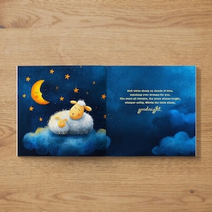 May include: A children's book illustration featuring a nighttime scene. Two white sheep rest on a blue cloud under a crescent moon and stars. The text reads "Soft white sheep on clouds of blue, goodnight."