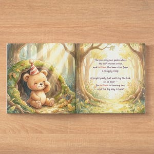 Puede incluir: Un libro infantil abierto en dos p&aacute;ginas que muestra un oso marr&oacute;n claro con un gorro de fiesta a rayas rojas y blancas dentro de un hueco de &aacute;rbol cubierto de musgo. La p&aacute;gina derecha contiene el texto: The morning sun peeks where the soft mosses creep, and William the bear stirs from a snuggly sleep. A bright party hat waits by the bed, oh so dear - for William is turning two, and the big day is here!