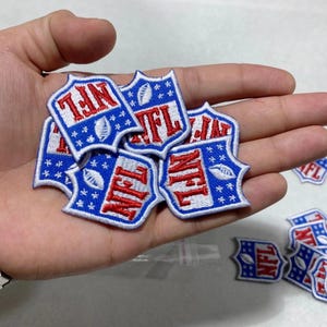Lote de 100 parches termoadhesivos con el logo de la NFL (tamaño pequeño)