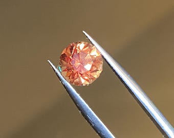 3.1ct 7.7mm lab grown orange sapphire round