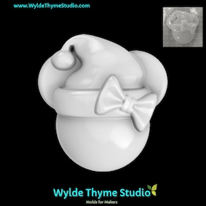 May include: White plastic mould of a Santa hat with a bow. The mould is designed for making soap, candles, or other crafts.