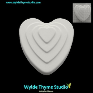 May include: White heart-shaped mold with concentric circles, creating a layered effect. The mold is made of silicone and is designed for crafting.