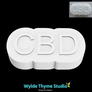 Puede incluir: Molde de silicona blanco con forma de nube con la palabra "CBD" en relieve en el centro.