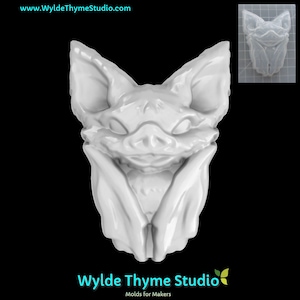 May include: White silicone mold of a bat with wings folded. The mold is designed for making resin crafts.