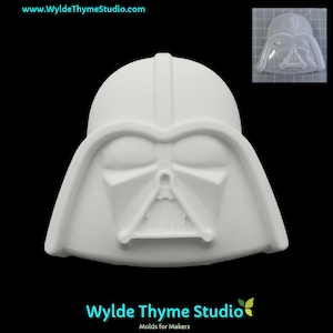 May include: White plastic mold of Darth Vader's head. The mold is designed for making soap, candles, or other crafts.