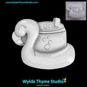 May include: White silicone mold of a flamingo float with a can of soda on top. The mold is designed for making soap, candles, or other crafts.