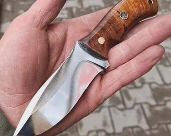 Bespoke handcrafted d2 steel skinner knife featuring a wooden handle