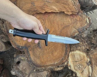 Bowie knife replica from the jack burton movie, crafted from stainless steel and includes sheath