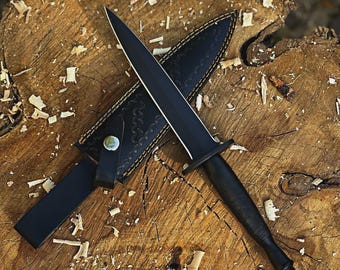 Bespoke double-edged dagger knife accompanied by a leather sheath