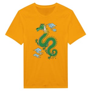 May include: A mustard yellow short-sleeve t-shirt featuring a central graphic of a green serpentine dragon with yellow accents. The dragon is depicted with a tiger head emerging from its neck, surrounded by stylised light blue clouds.