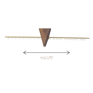 May include: A wooden jewellery organiser with a triangular centre piece and a horizontal bar with small hooks. The organiser is 43cm (16.9 inches) wide. The wood has a natural grain, and the hooks are gold-coloured.