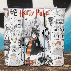 May include: Three white stainless steel tumblers featuring a Harry Potter theme. The tumblers are decorated with illustrations of characters, quotes, and symbols from the series, including the Hogwarts castle and the words "Mischief Managed."