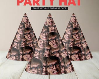 May include: Party hats with a repeating pattern of a person's face wearing glasses and making a funny face. The text "PARTY HAT" is displayed in red at the top of the image.