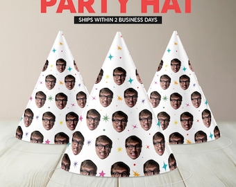 May include: Three white party hats with a repeating pattern of a person's face wearing glasses. The hats have a cone shape and are decorated with colorful stars. The words "PARTY HAT" are printed in red at the top.