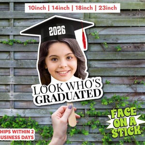 custom graduation fan, childhood photo grad, baby photo graduation, personalized grad gift, class of 2026, funny face prop, big head fan, graduation fan with name, senior ceremony fan, custom face on stick, vintage grad gift, graduation party decor, photo face cutout, grad keepsake, unique graduation gift, senior 2026 decor, funny grad prop, custom party prop, graduation photo prop, retro grad fan, baby face cutout, personalized photo fan
