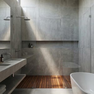 May include: A modern bathroom with gray concrete walls and a wooden floor. The bathroom features a double sink, a shower with a rain shower head, and a freestanding white bathtub. The design is minimalist and contemporary.