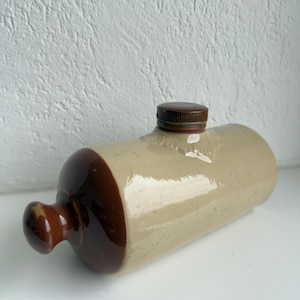 Calentador de cama antiguo de gres