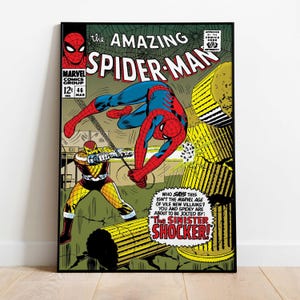 May include: A framed comic book cover of The Amazing Spider-Man. Spider-Man in a red and blue suit is fighting a villain in a yellow and black suit. The comic book cover has the Marvel Comics Group logo and the text "The Sinister Shocker!"