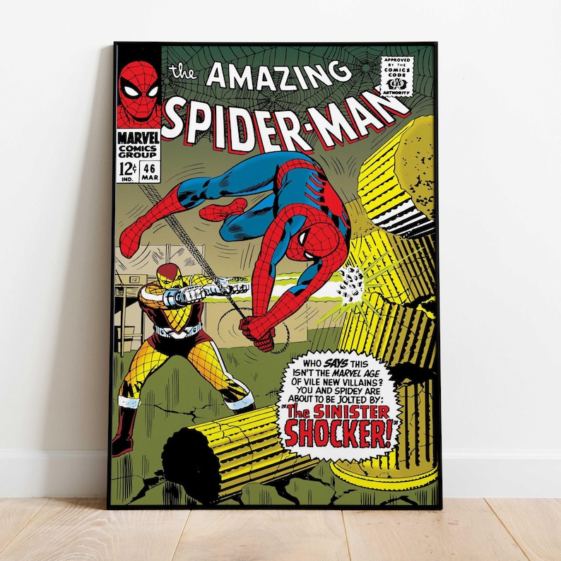 May include: A framed comic book cover of The Amazing Spider-Man. Spider-Man in a red and blue suit is fighting a villain in a yellow and black suit. The comic book cover has the Marvel Comics Group logo and the text "The Sinister Shocker!"