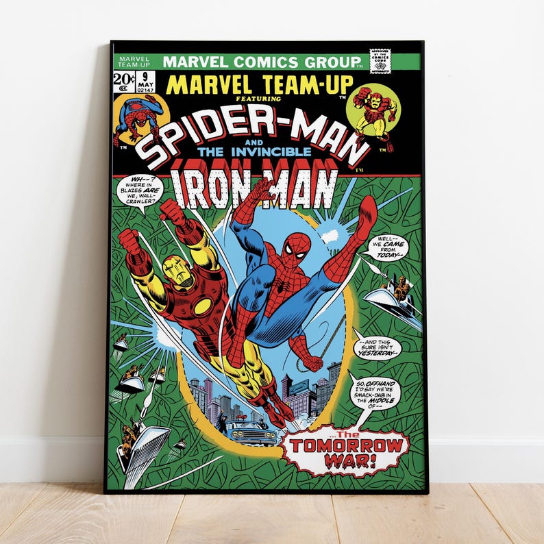 May include: Comic book cover featuring Spider-Man and Iron Man in action. The title reads "Marvel Team-Up" with the text "The Tomorrow War!" in a bold font. The artwork is in vibrant colors, with a green background.