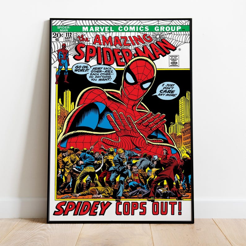 May include: A framed comic book cover featuring Spider-Man. The cover art shows Spider-Man in a red and blue suit with his hands outstretched. The title "Amazing Spider-Man" is prominently displayed, along with the text "Spidey Cops Out!"