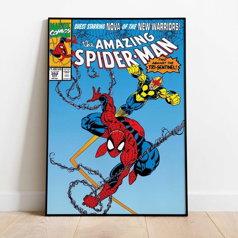 May include: A framed comic book cover featuring Spider-Man in a dynamic pose, battling an opponent. The cover art is vibrant with red, blue, and yellow hues against a blue backdrop. Text includes "The Amazing Spider-Man" and "Guest Starring Nova of the New Warriors!"