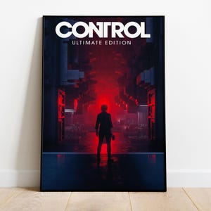 May include: A framed poster for the video game "Control: Ultimate Edition." The poster shows a silhouetted figure in a red-lit corridor. The game's title is displayed in white at the top.