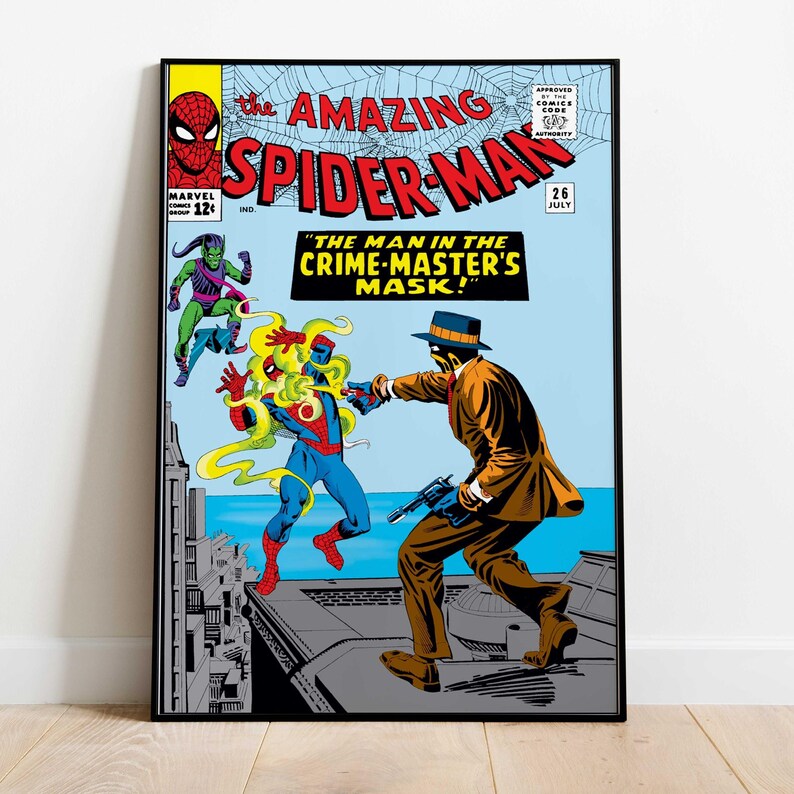 May include: A framed comic book cover of The Amazing Spider-Man, issue 26, featuring Spider-Man battling a figure in a brown suit and hat. The cover art is in vibrant colors, with text that reads "The Man in the Crime-Master's Mask!"