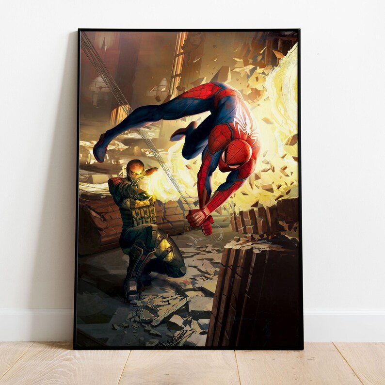 May include: A framed print featuring a dynamic action scene of Spider-Man in a red and blue suit, battling a character in green and gold armor. The background depicts a fiery explosion and crumbling structures.