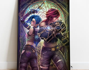 Op de afbeelding: Een ingelijste kunstdruk met twee vrouwelijke personages uit een videogame. Eén heeft blauw haar en houdt een gloeiend apparaat vast, de ander heeft rood haar en draagt mechanische handschoenen. De achtergrond toont een glas-in-loodraam.