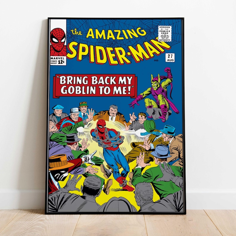 May include: A framed vintage comic book cover of The Amazing Spider-Man #27. The cover features Spider-Man in a blue and red suit, bound by chains, surrounded by people. The text reads "BRING BACK MY GOBLIN TO ME!"