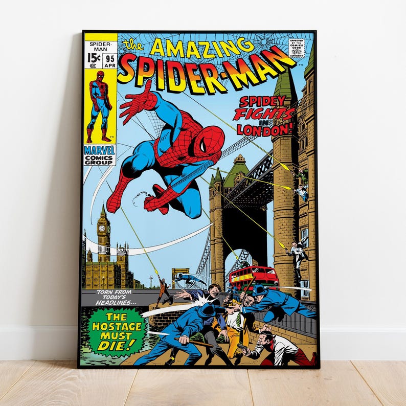 May include: A framed comic book cover featuring Spider-Man in a dynamic pose against a London backdrop. The title reads "The Amazing Spider-Man" with additional text "Spidey Fights in London!" and "The Hostage Must Die!" in a vintage comic book style.