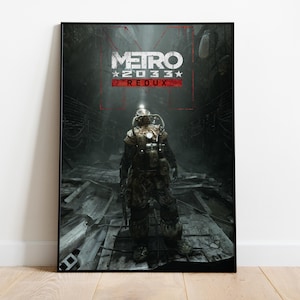 May include: A framed poster featuring the video game "Metro 2033 Redux." The artwork depicts a figure in a gas mask and protective gear, standing in a dark, industrial tunnel. The game's title is displayed at the top in white and red.