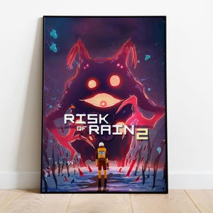 May include: Framed poster featuring the game "Risk of Rain 2." The artwork depicts a dark purple, monstrous figure with glowing eyes and red tendrils, looming over a lone figure in a yellow and brown suit. The game's title is prominently displayed.