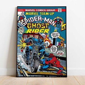May include: A framed comic book cover featuring Spider-Man and Ghost Rider. The cover art is in vibrant colours, with Spider-Man in a red and blue suit and Ghost Rider on a motorcycle. Text includes "Marvel Team-Up" and "Marvel Comics Group."