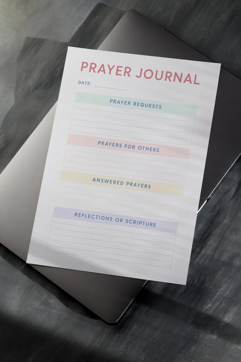 May include: A printable prayer journal with sections for prayer requests, prayers for others, answered prayers, and reflections or scripture. The journal has a light blue, pink, yellow, and green color scheme.