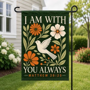 May include: A dark green garden flag featuring a white dove in the center surrounded by orange and cream-colored flowers and leaves. The text reads I AM WITH YOU ALWAYS and MATTHEW 28:20 in a cream-colored serif font on the top and bottom.