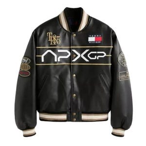 May include: Black varsity jacket with gold and white accents. Features the text "T185" and "APXGP" across the front, along with the Tommy Hilfiger logo. The jacket has a ribbed collar, cuffs, and hem with striped detailing.