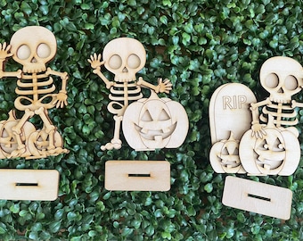 DIY Skeleton Shelf Sitter - Halloween themed tiered tray vignette wood sign whimsy October spider web pumpkins table top