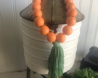 Wood bead garland - Carrot themed vignette tiered tray farmhouse orange green