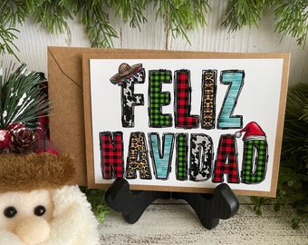 Felix Navidad Greeting Card - Blank note card Southwest Cactus Santa hat buffalo check red black wreath lights Hispanic