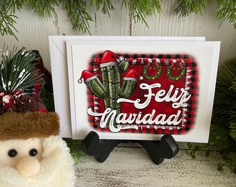 Felix Navidad Greeting Card - Blank note card Southwest Cactus Santa hat buffalo check red black wreath lights Hispanic
