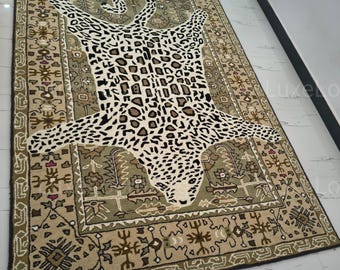 Alfombra Octivia Leopardo tejida a mano. Alfombra de lana tejida a mano con estampado animal. Disponible en tamaños de 5x8, 6x9, 7x10, 8x10, 9x12 y 10x14 pies. Alfombra grande multicolor.