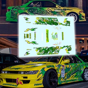 May include: A decal sheet featuring various green and yellow flame-patterned graphics, including the text REVERSE, BANDANA, and Japanese characters. The stickers are designed for automotive application, showcasing multiple sizes and shapes for vehicle customization.
