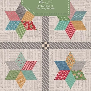 May include: A quilt pattern titled "Home Town Stars" by Lori Holt of Bee in my Bonnet. The design features star patterns in various colors, including red, blue, green, and yellow. The finished size is 65 1/2" x 65 1/2".