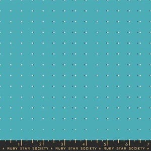 May include: Teal fabric with a repeating pattern of small, white dots. The dots are evenly spaced and have a subtle shadow effect, creating a sense of depth. The fabric is from the Ruby Star Society.