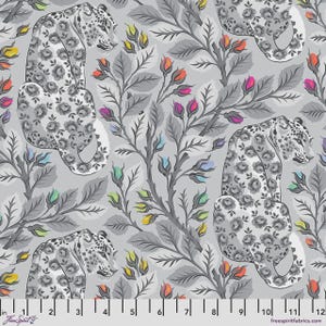 May include: A fabric pattern featuring stylized leopards with floral patterns, set against a gray backdrop with gray foliage and colorful buds. The design includes a ruler with inch measurements along the bottom.