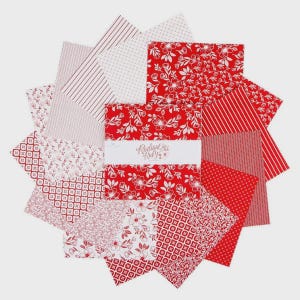 May include: A collection of red and white fabric squares arranged in a circular pattern. The squares feature various patterns, including floral designs, stripes, and geometric shapes. The text "Radical Ruby" is visible on a white label.
