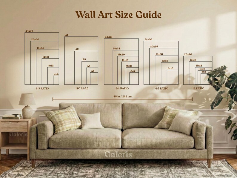 May include: A wall art size guide with various rectangular frame sizes, including 24x30, 20x27, and 20x20 inches, displayed above a beige sofa. The text "Wall Art Size Guide" is at the top. The sofa is 88 inches (223 cm) wide.
